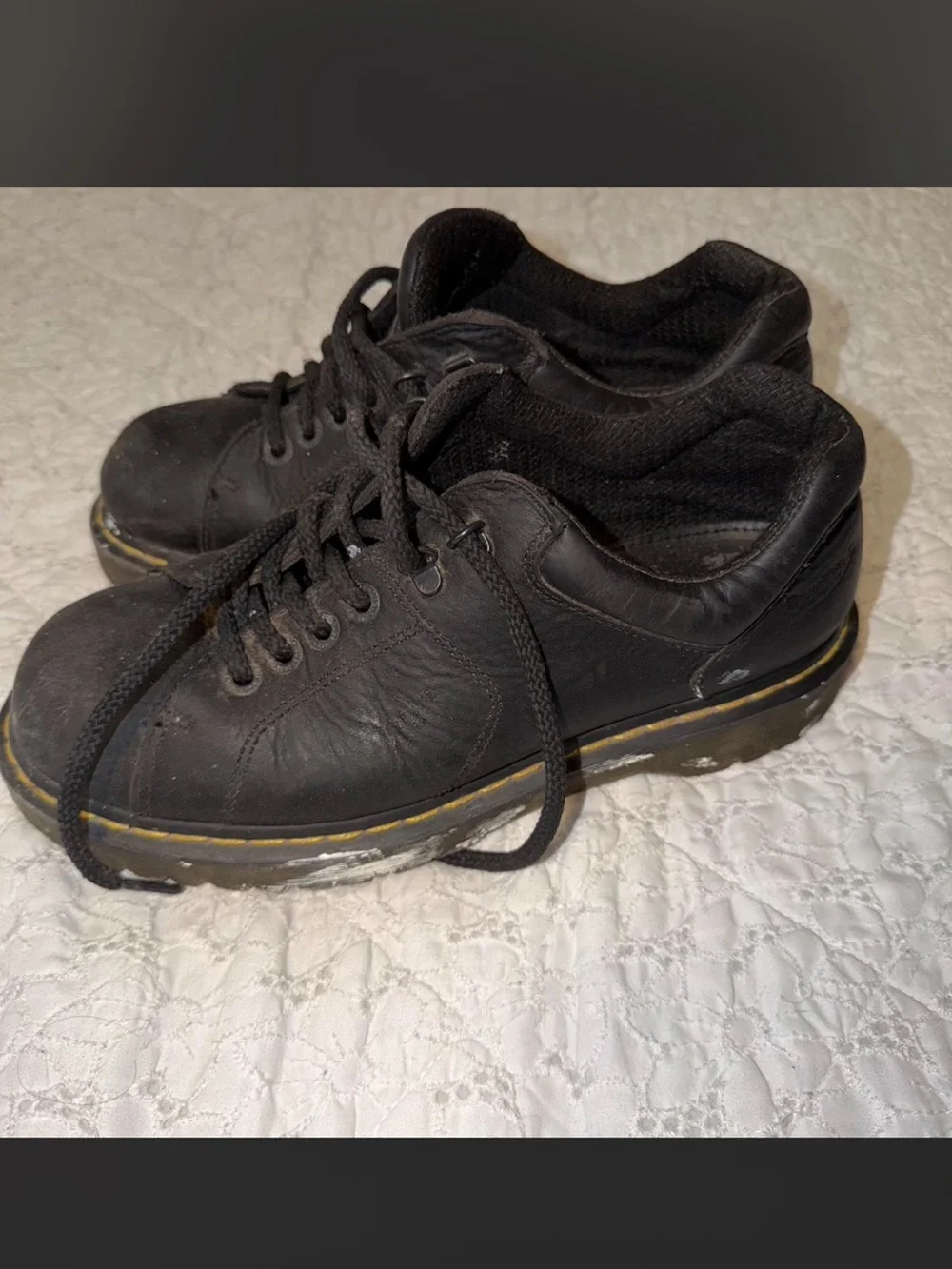 Dr. Martens Black Leather Low-Top Sneakers with Yellow Welt Stitch